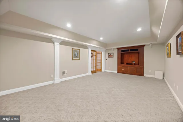 a room with furniture and wooden floor