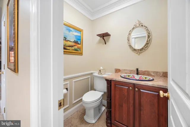 a view of a bedroom with wooden floor