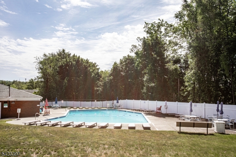 1130 Valley Road, Unit 2B Wayne, NJ 07470 - Photo 47 of 47 a view of a house with swimming pool and sitting area