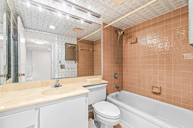 a view of an empty room with a large window