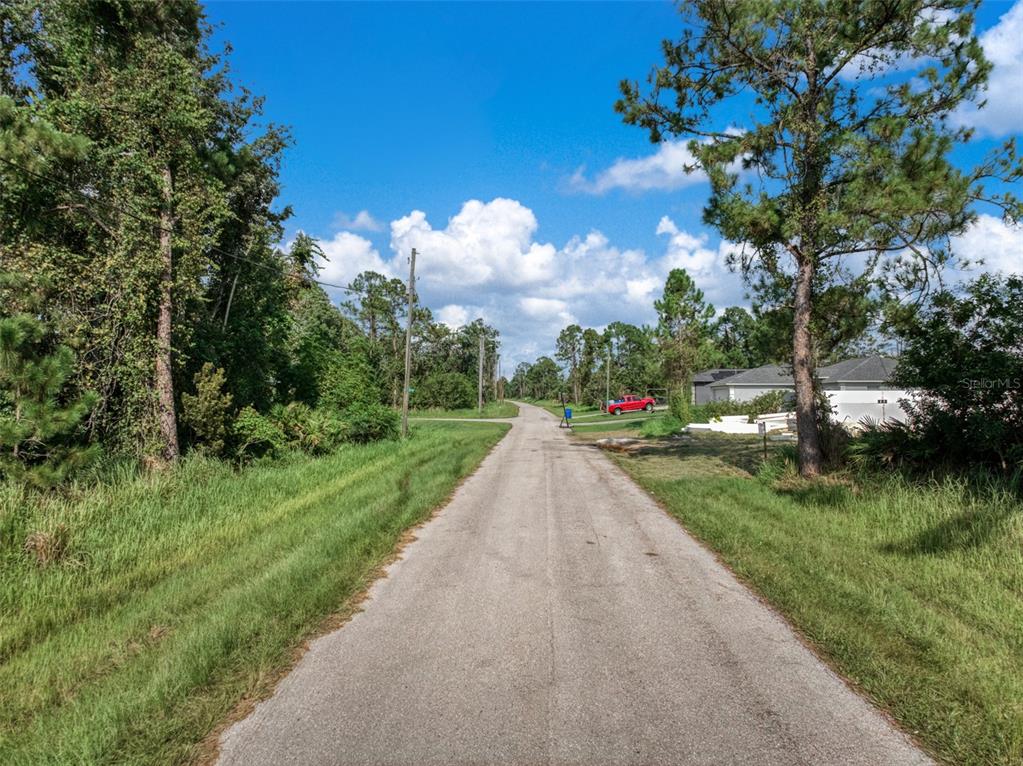 7922 Bernal Drive Sebring, FL 33872 - Photo 9 of 22 a view of a garden with a lake view