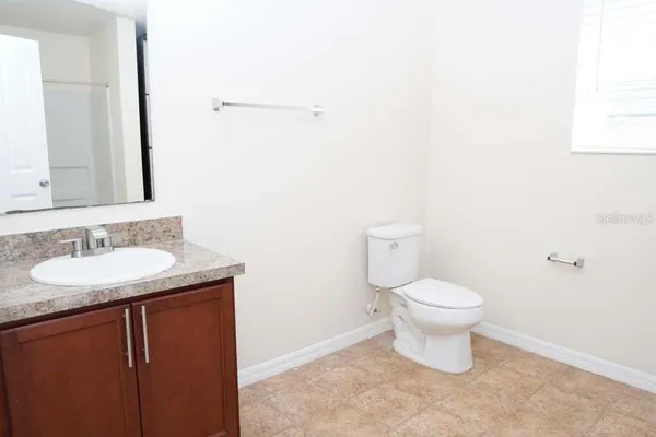 a bathroom with a sink and a toilet