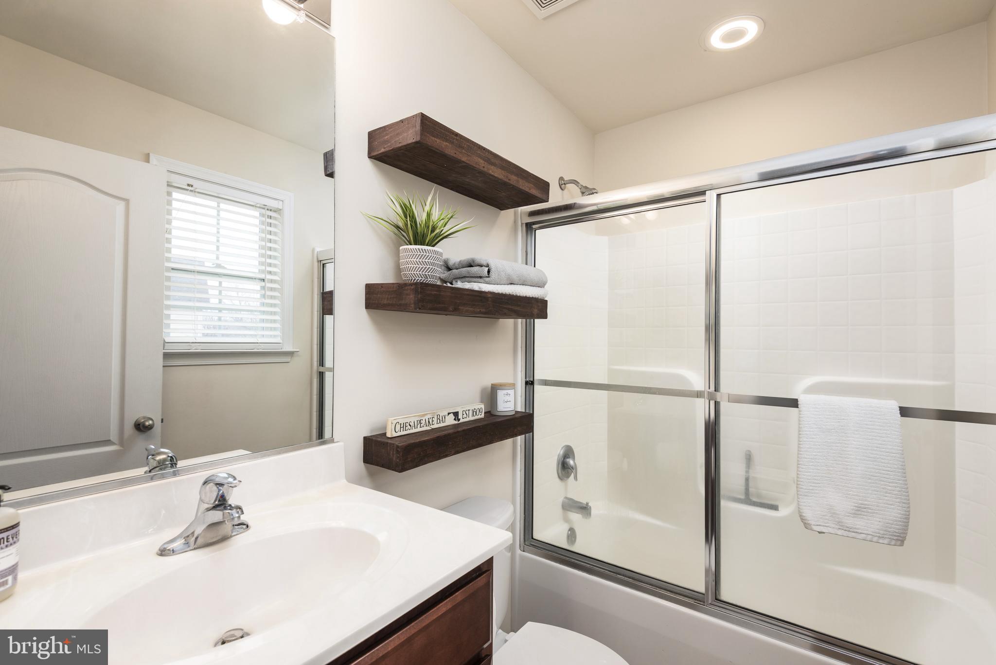 109 Price Road Chester, MD 21619 - Photo 21 of 32 Primary bedroom full bathroom