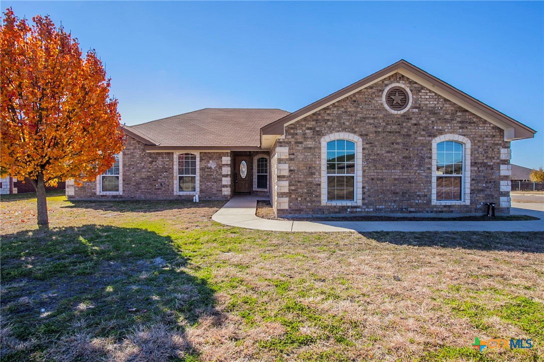 3710 Dewitt County Court Killeen, TX 76549 - Photo 1 of 18 a front view of a house with a yard