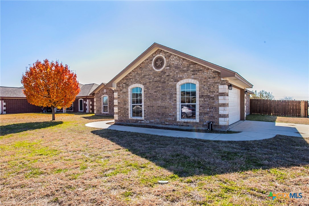 3710 Dewitt County Court Killeen, TX 76549 - Photo 16 of 18 a front view of a house with a yard