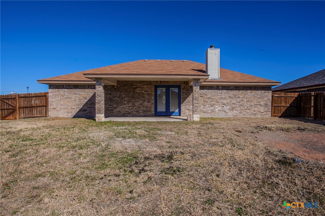 3710 Dewitt County Court Killeen, TX 76549 - Photo 17 of 18 a front view of a house with a yard