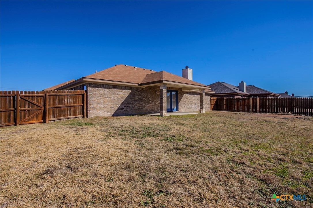 3710 Dewitt County Court Killeen, TX 76549 - Photo 18 of 18 a front view of a house with a yard