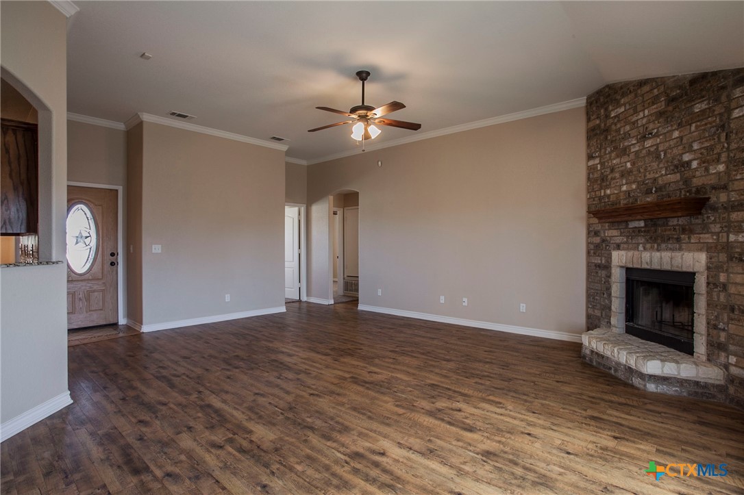 3710 Dewitt County Court Killeen, TX 76549 - Photo 2 of 18 a view of an empty room with window and fireplace