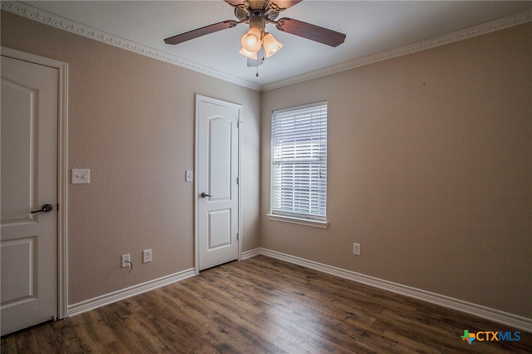 3710 Dewitt County Court Killeen, TX 76549 - Photo 10 of 18 an empty room with fan and windows