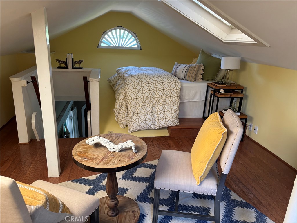 287 Myrtle Street Laguna Beach, CA 92651 - Photo 7 of 50 a view of a dining room with furniture and wooden floor