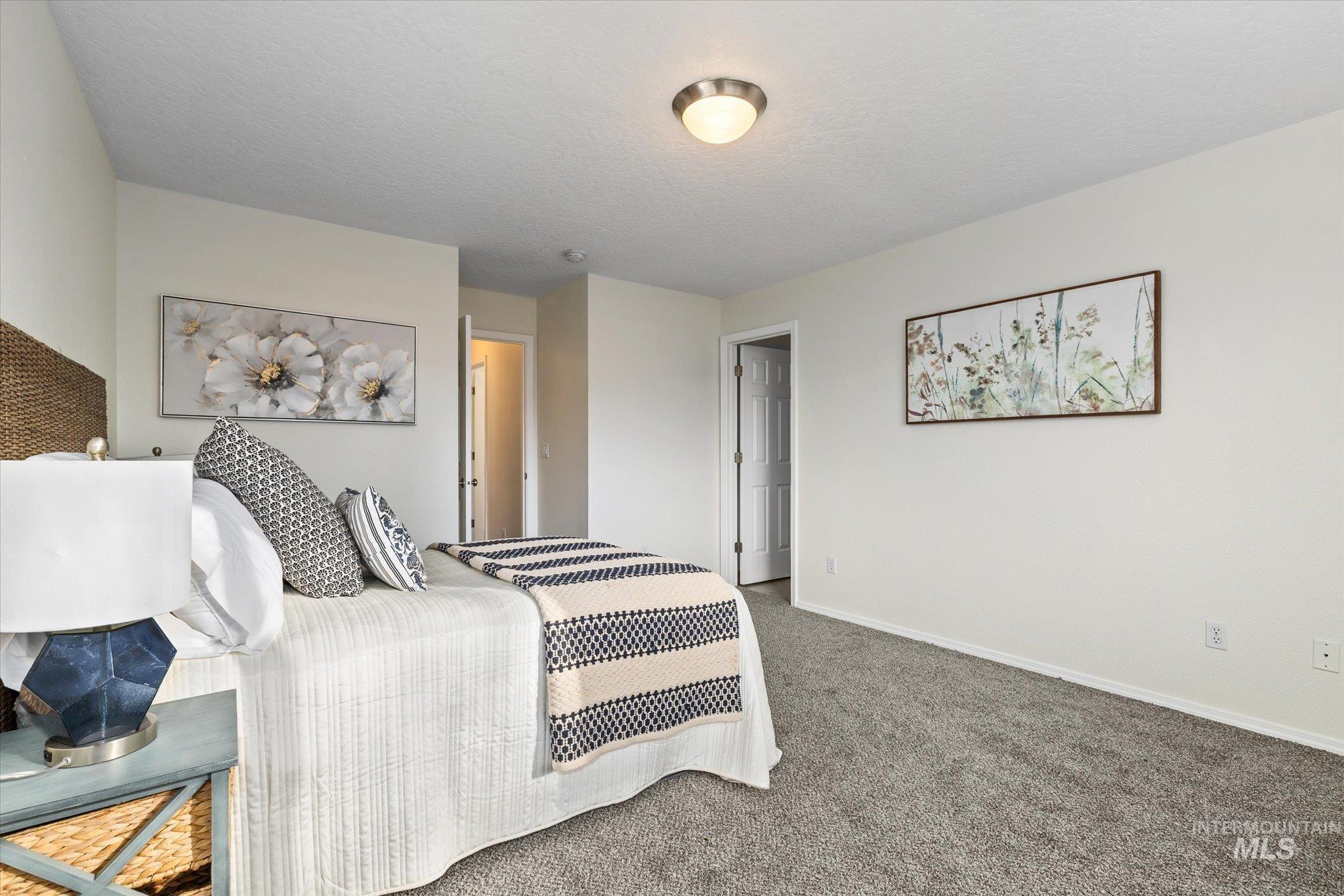 1399 West Gander Drive Meridian, ID 83642 - Photo 22 of 40 Bedroom with carpet flooring and baseboards