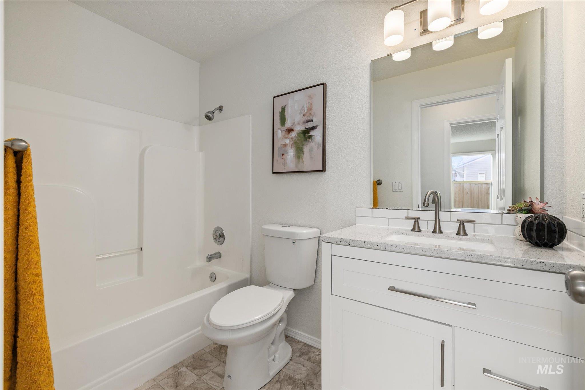 1399 West Gander Drive Meridian, ID 83642 - Photo 28 of 40 Bathroom with vanity and tub / shower combination