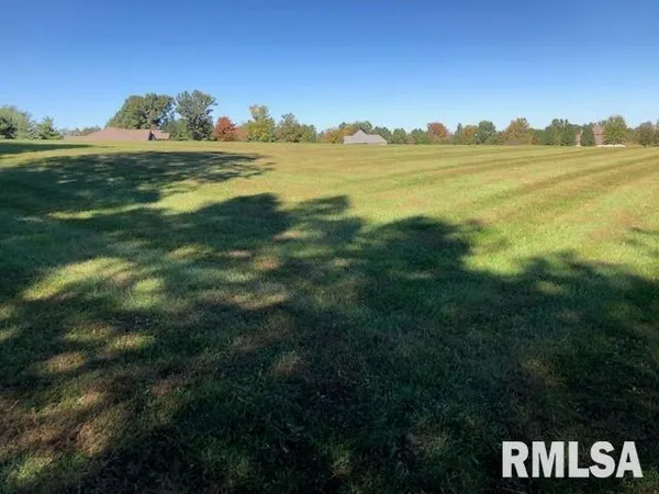 a view of an ocean from a mountain