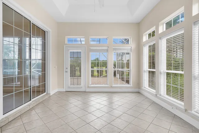 a view of an empty room with a large window