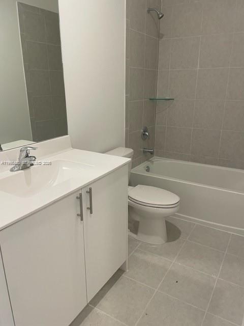 29009 Southwest 162nd Court, Unit 29009 Homestead, FL 33033 - Photo 12 of 26 a bathroom with a sink a toilet and shower