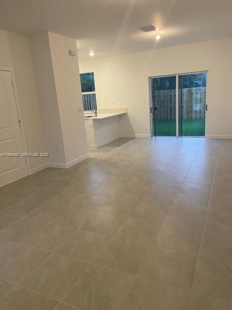 29009 Southwest 162nd Court, Unit 29009 Homestead, FL 33033 - Photo 4 of 26 a view of livingroom with furniture