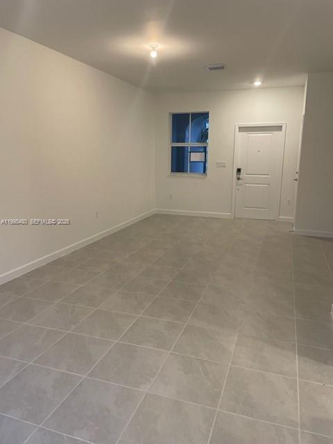 29009 Southwest 162nd Court, Unit 29009 Homestead, FL 33033 - Photo 7 of 26 a view of an empty room