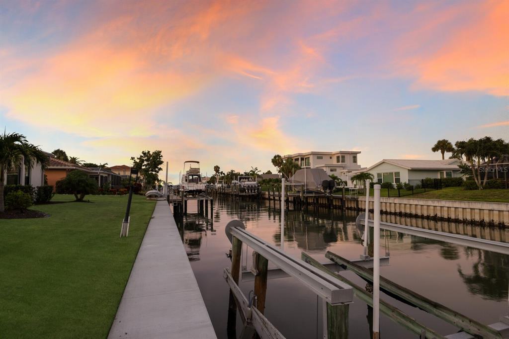 510 Putter Lane Longboat Key, FL 34228 - Photo 27 of 74 a view of a lake with a large bridge