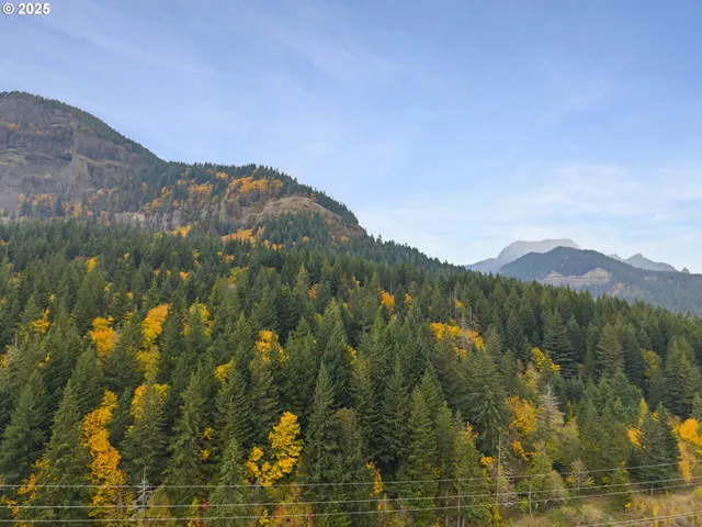 a view of mountain view with mountains in the background