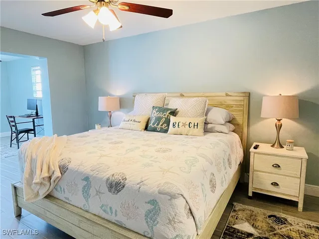 a sitting area with a table and chairs