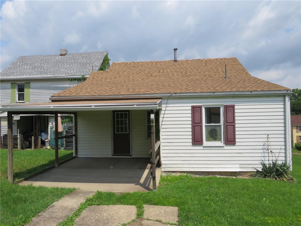 666 Ewing Street Washington, PA 15301 - Photo 16 of 22 a view of a house with a yard and plants