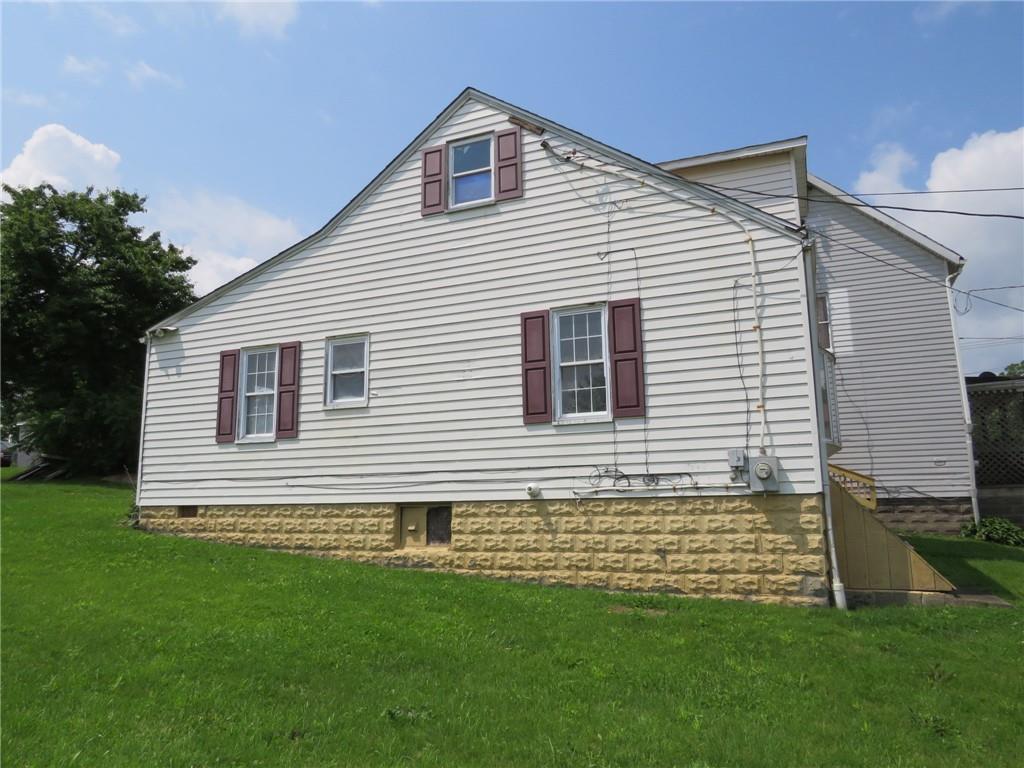 666 Ewing Street Washington, PA 15301 - Photo 22 of 22 a view of a house with a yard
