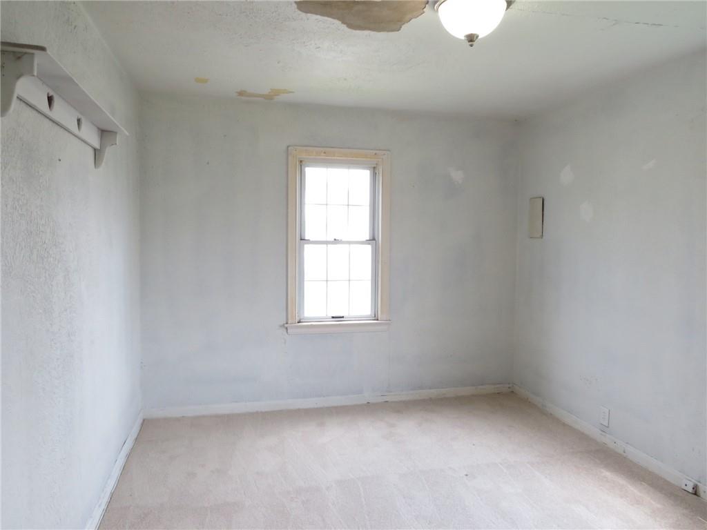 666 Ewing Street Washington, PA 15301 - Photo 7 of 22 an empty room with a window