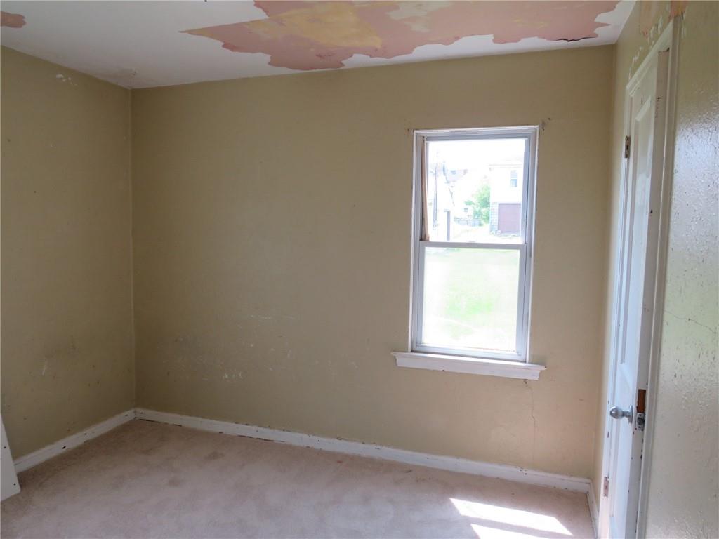 666 Ewing Street Washington, PA 15301 - Photo 10 of 22 an empty room with a window