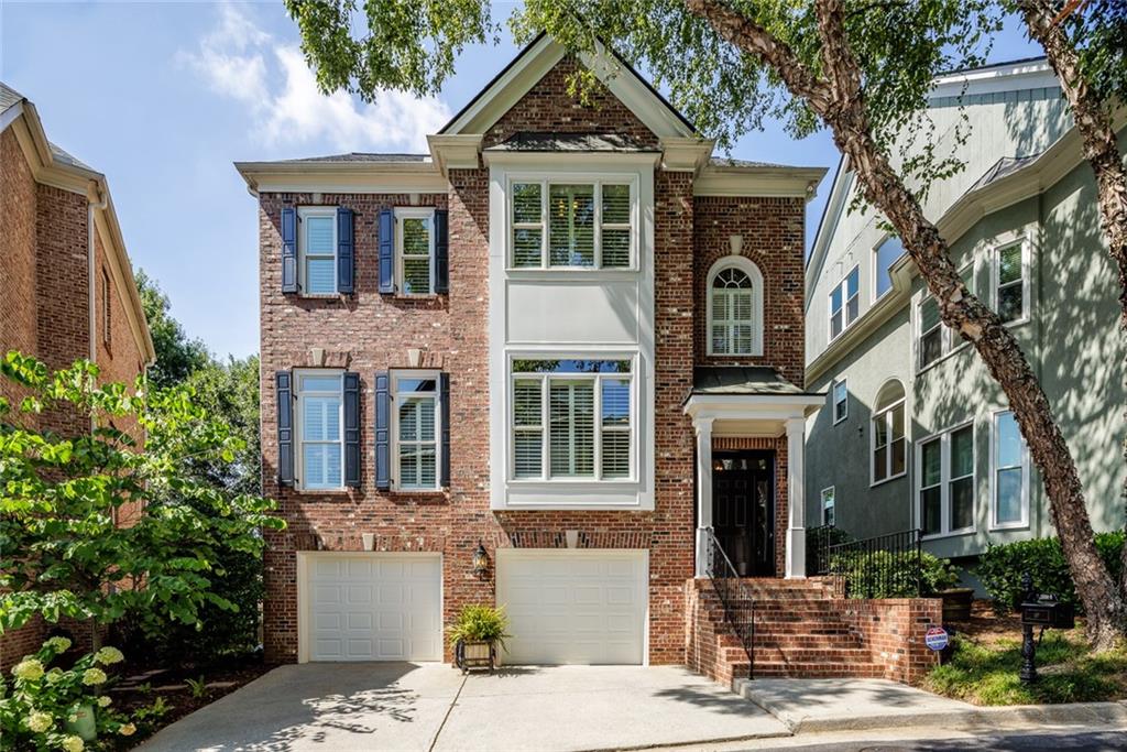 2694 Lenox Road Northeast, Unit 8 Atlanta, GA 30324 - Photo 1 of 1 John Willis Brick Home Freshly Painted