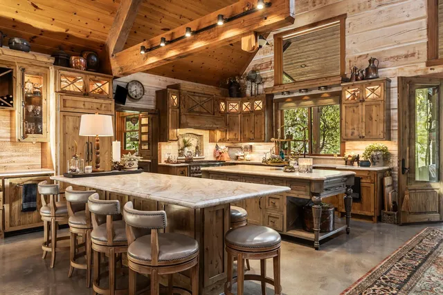 a dinning table and chairs in the kitchen