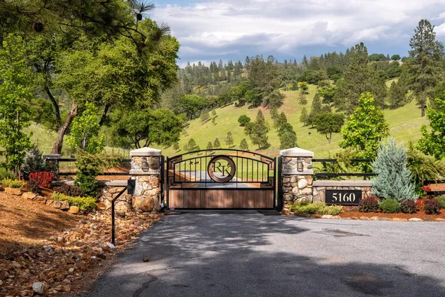a view of a street with sitting area