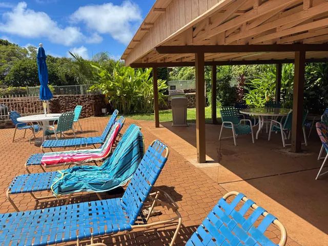 a view of a swimming pool with a patio