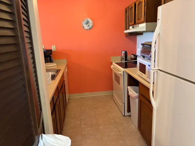 a view of kitchen and utility room