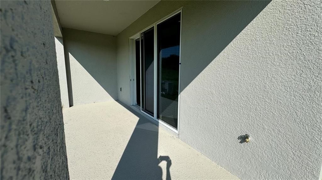 1442 Isleta Loop Kissimmee, FL 34741 - Photo 4 of 28 a view of balcony with stairs