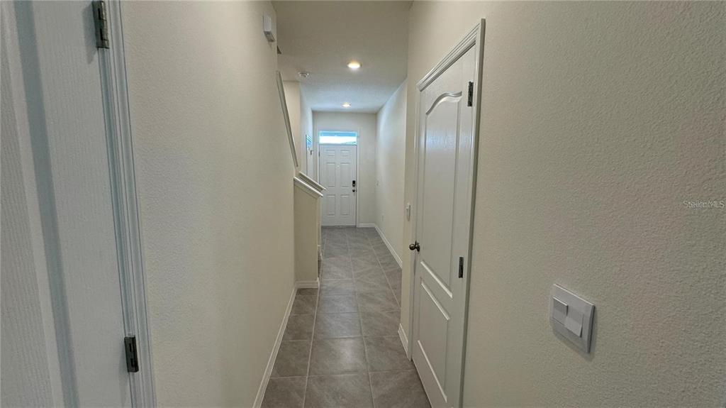 1442 Isleta Loop Kissimmee, FL 34741 - Photo 8 of 28 a view of a hallway