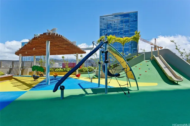 a view of a park with a slide