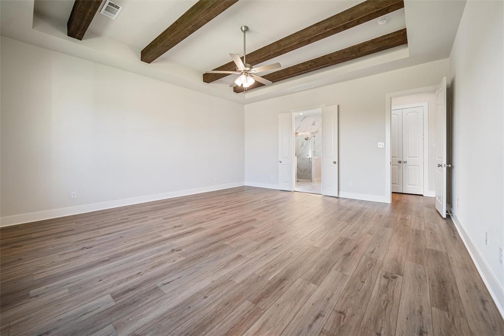 404 Indian Creek Road Van Alstyne, TX 75495 - Photo 22 of 40 a view of a big room with wooden floor
