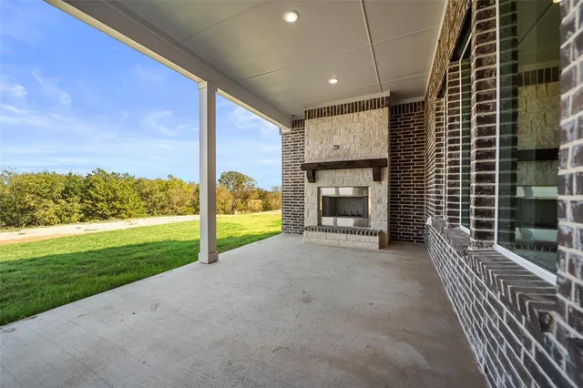 a view of a porch with a yard
