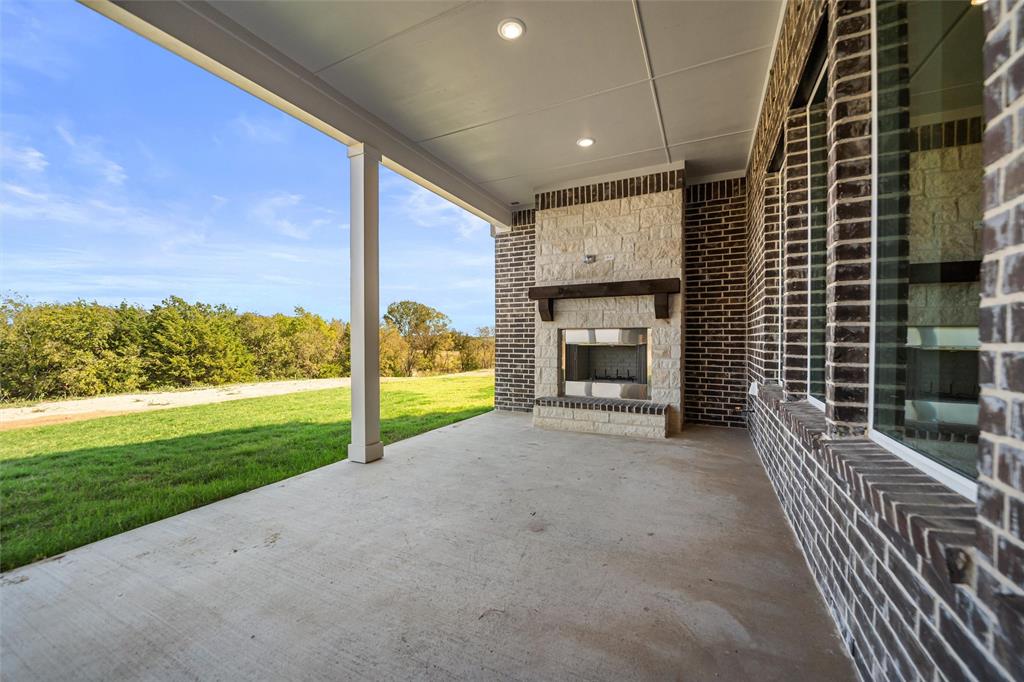 404 Indian Creek Road Van Alstyne, TX 75495 - Photo 30 of 40 a view of a porch with a yard