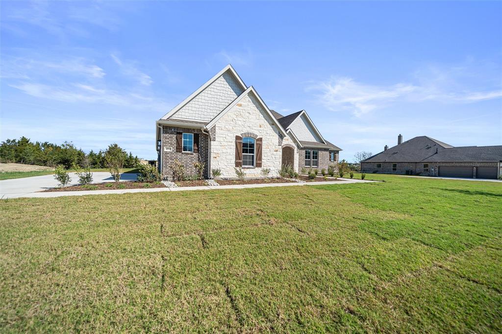 404 Indian Creek Road Van Alstyne, TX 75495 - Photo 4 of 40 a view of a house with a yard