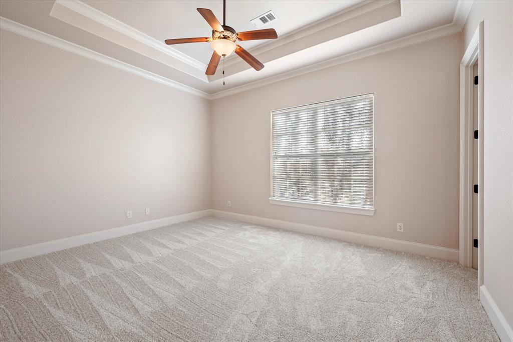 1600 Enclave Court Southlake, TX 76092 - Photo 27 of 40 an empty room with a window and a fan