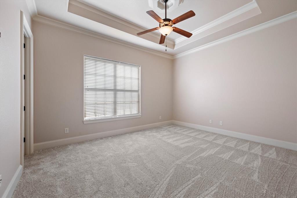 1600 Enclave Court Southlake, TX 76092 - Photo 29 of 40 an empty room with a window and a fan