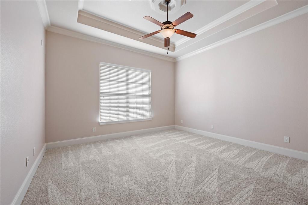 1600 Enclave Court Southlake, TX 76092 - Photo 30 of 40 an empty room with windows and fan