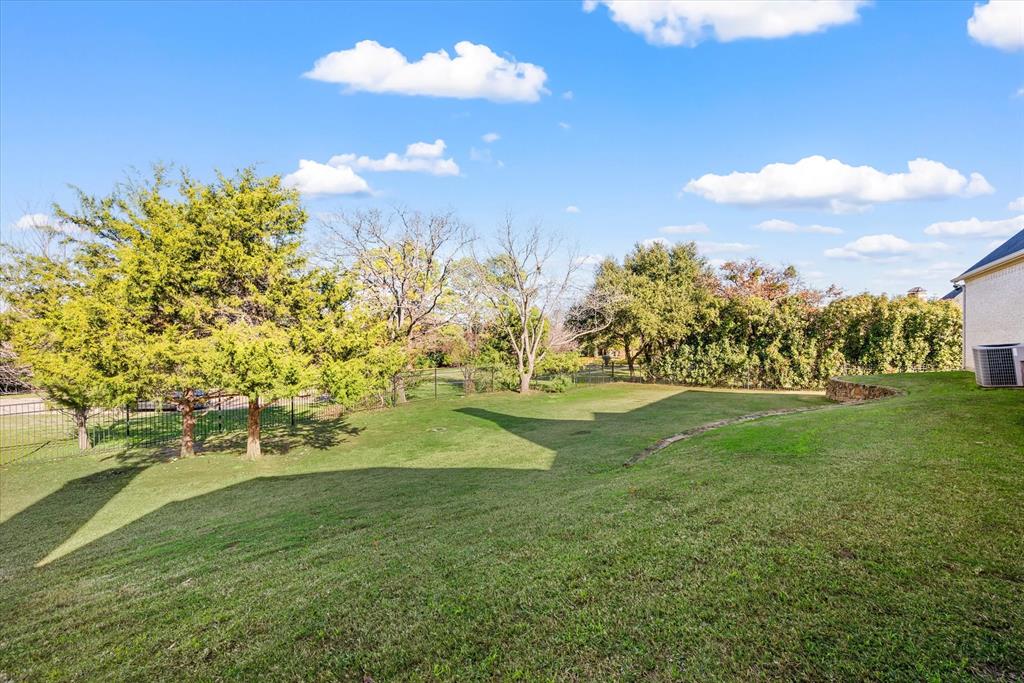 1600 Enclave Court Southlake, TX 76092 - Photo 37 of 40 a view of a golf course with a lake