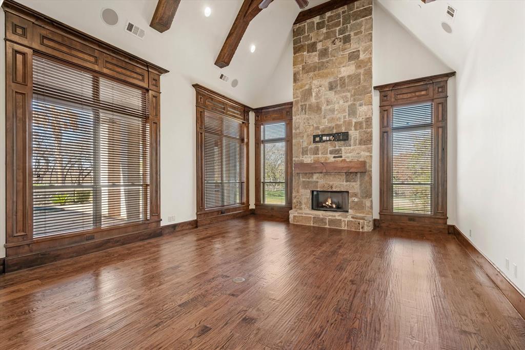 1600 Enclave Court Southlake, TX 76092 - Photo 6 of 40 a view of an empty room with wooden floor and a window