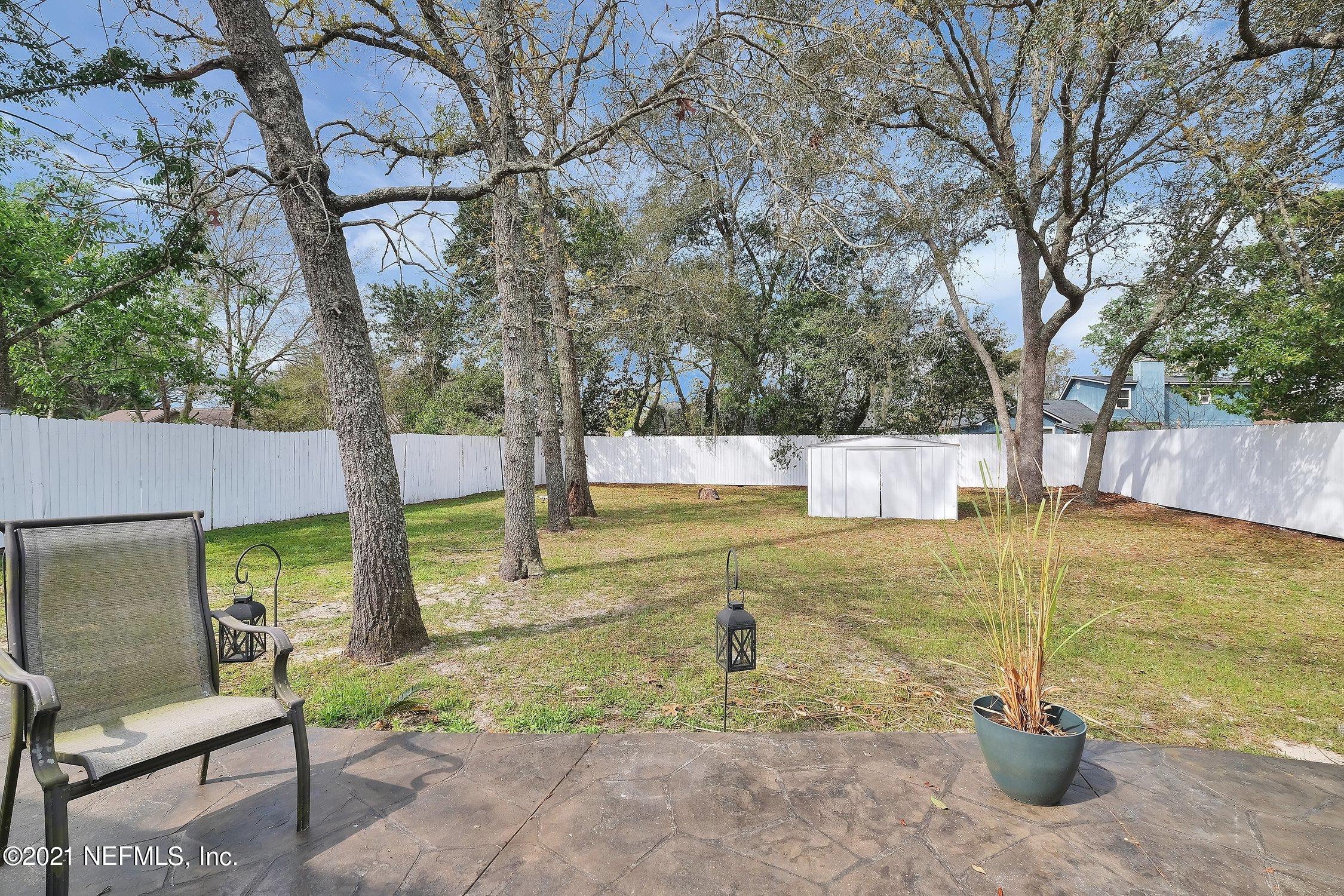 12840 Beaubien Road Jacksonville, FL 32258 - Photo 22 of 25 a view of a backyard with swimming pool