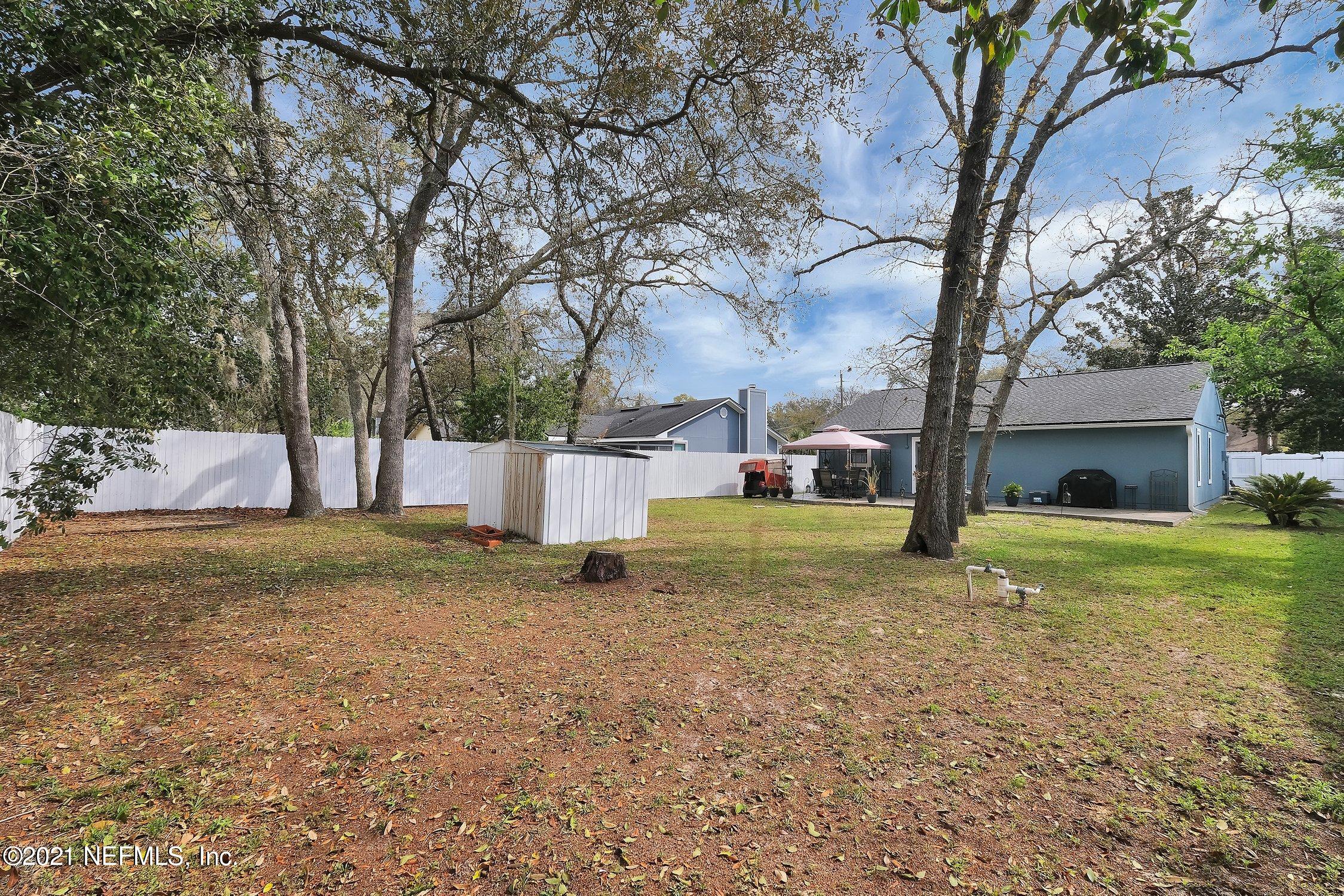12840 Beaubien Road Jacksonville, FL 32258 - Photo 25 of 25 a view of a house with a yard