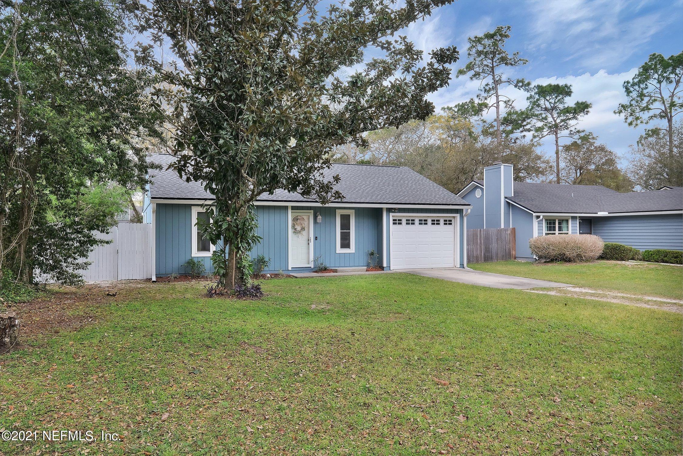 12840 Beaubien Road Jacksonville, FL 32258 - Photo 3 of 25 front view of a house with a yard