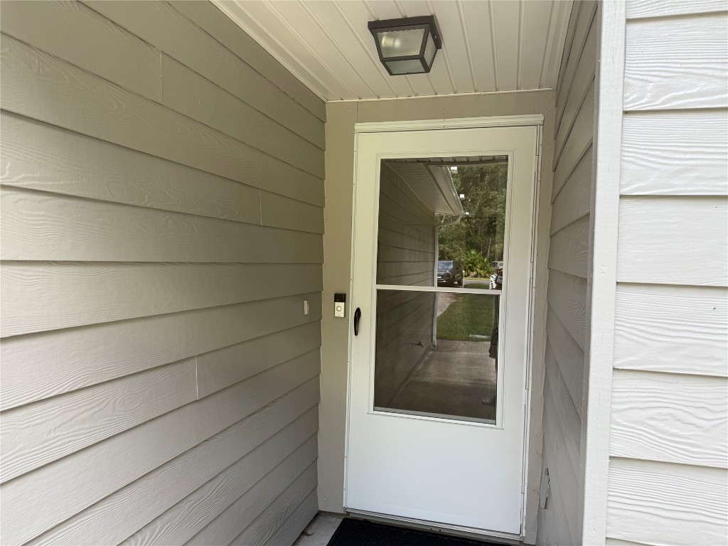 96118 Green Pine Road Yulee, FL 32097 - Photo 3 of 20 a view of a door and a window