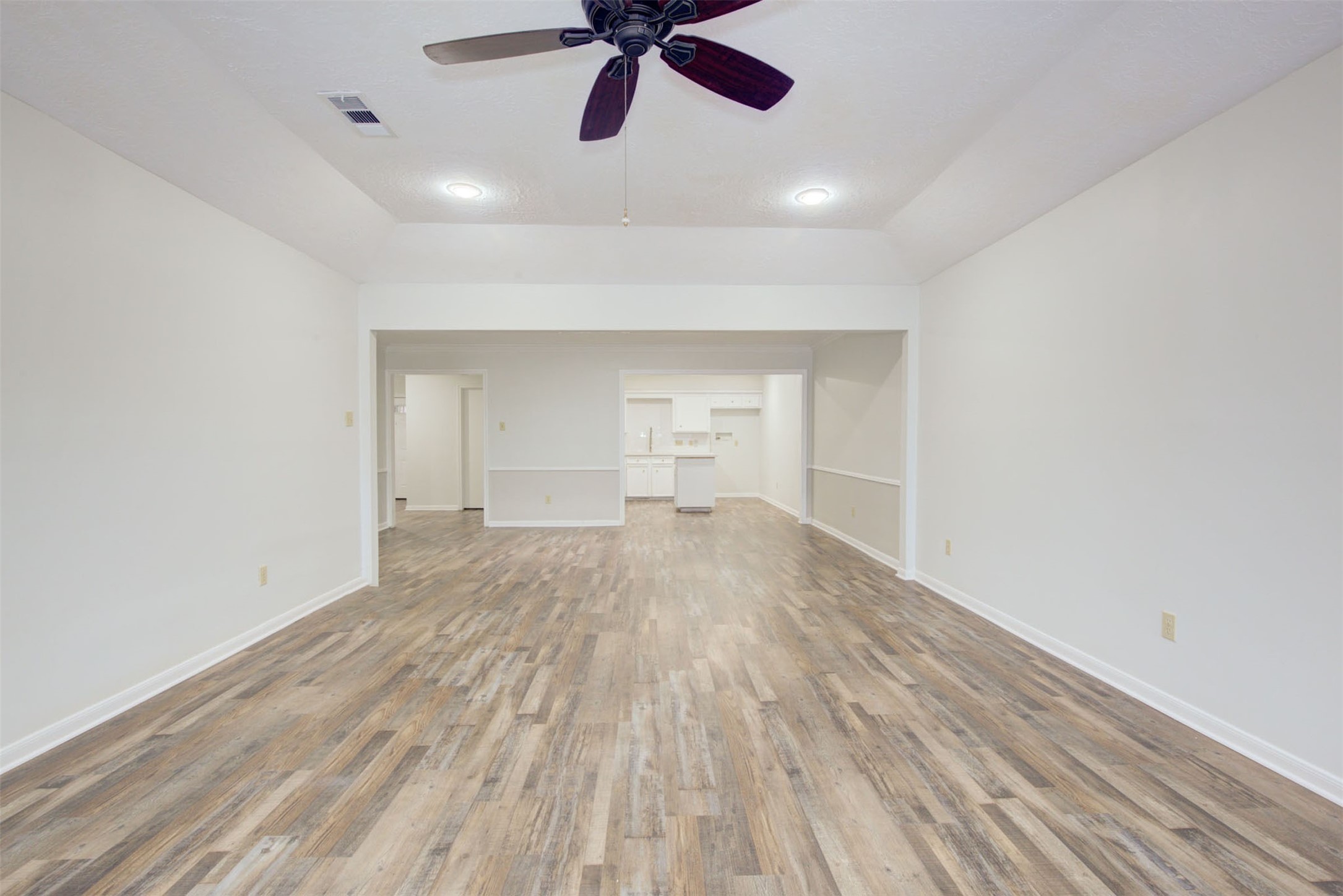 1402 Forest Home Drive Houston, TX 77077 - Photo 16 of 35 a view of empty room with wooden floor and window
